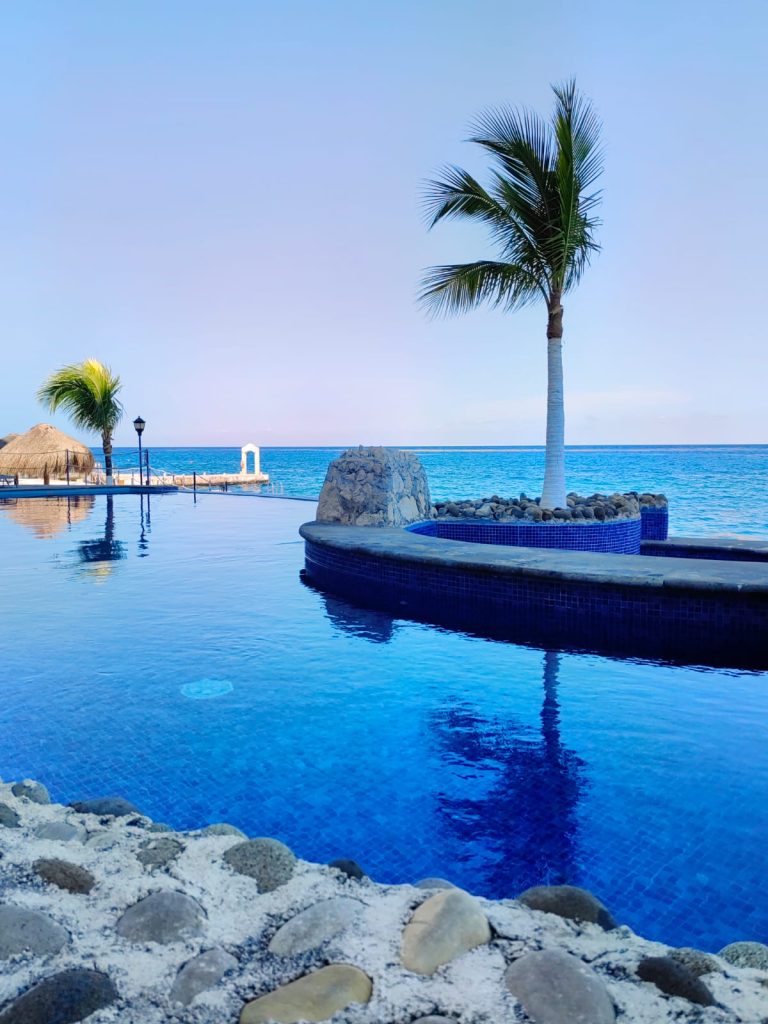 Outdoor Swimming Pool area at El cantil Cozumel